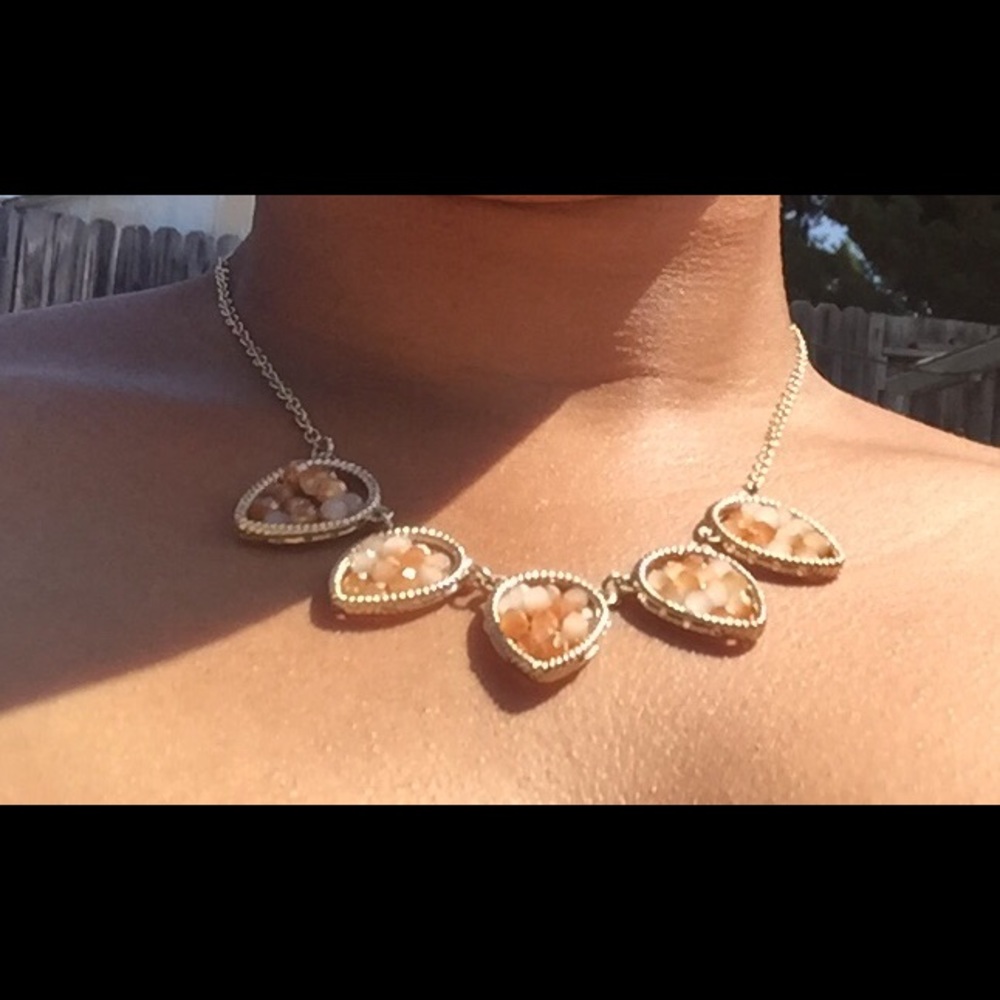 Gold beaded necklace with blush toned beads